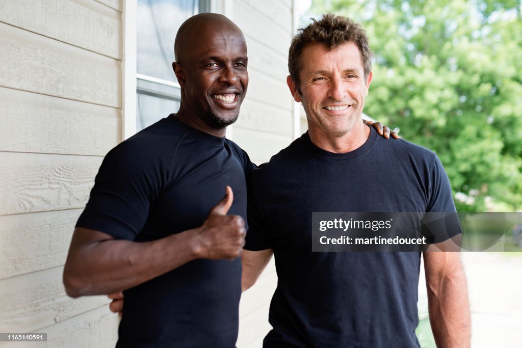 Portrait of two mature men in summer.