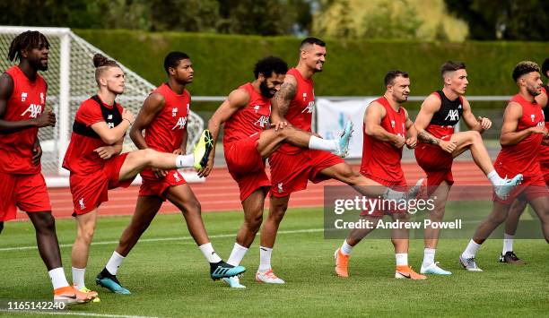 Mohamed Salah, Harvey Elliott, Rhian Brewster and Dejan Lovren of Liverpool during a training session on July 30, 2019 in Evian-les-Bains, France.