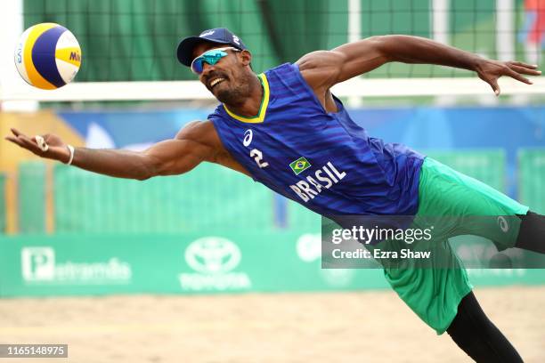 Thiago Dealtry of Brazil dives for the ball during men's beach volleyball placement 7th-8th match between Brazil and Venezuela on Day 4 of Lima 2019...