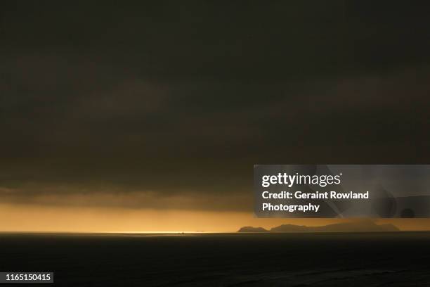 moody seascape - sliver stock pictures, royalty-free photos & images