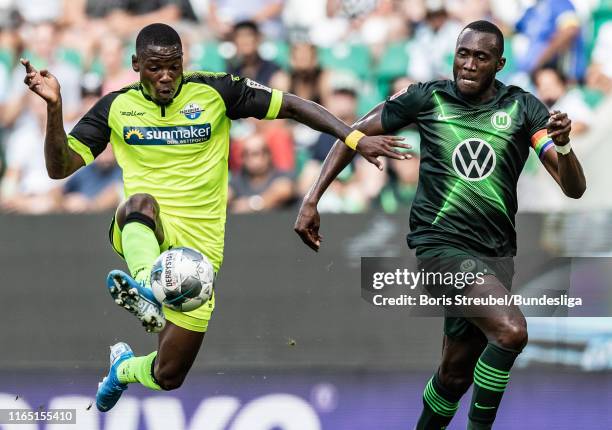 Streli Mamba of SC Paderborn 07 In action with Josuha Guilavogui of VfL Wolfsburg during the Bundesliga match between VfL Wolfsburg and SC Paderborn...