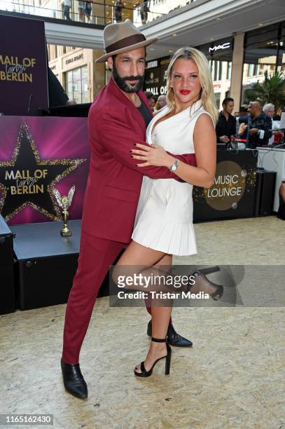 Massimo Sinato and Evelyn Burdecki attend the Mall of Berlin Dance Competition Finals on August 31, 2019 in Berlin, Germany.
