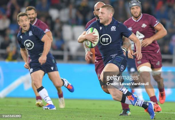 Finn Russell of Scotland runs with ball during the rugby international match between Georgia and Scotland at Dinamo Arena on August 31, 2019 in...