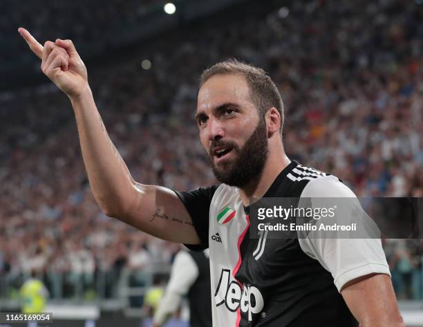 Gonzalo Higuain of Juventus celebrates after scoring the second goal of his team during the Serie A match between Juventus and SSC Napoli at Allianz...