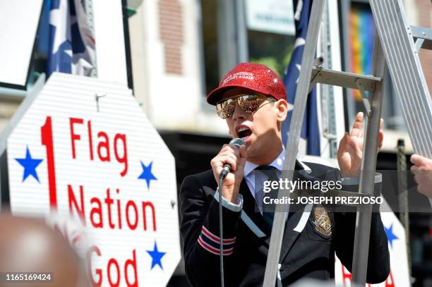 Parade Marshall and far-right political commentator Milo Yiannopoulos speaks during the "Straight Pride" parade in Boston, on August 31, 2019. -...