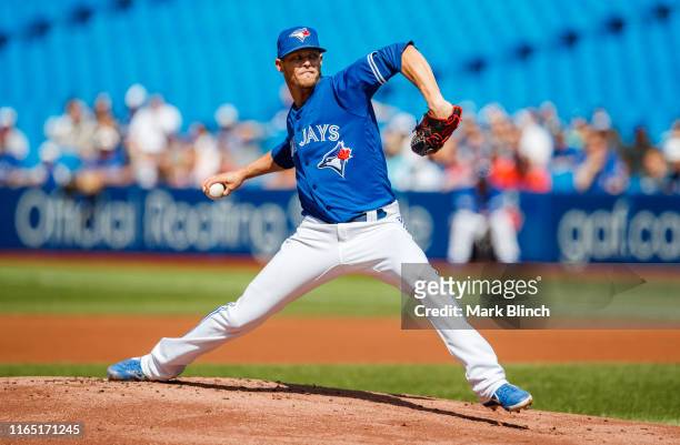 Clay Buchholz of the Toronto Blue Jays pitches to the Houston Astros in the first inning during their MLB game at the Rogers Centre on August 31,...