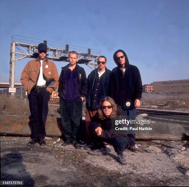 Portait of the members of American Rock group 311 as they poses outdoors, Chicago, Illinois, March 14, 1993. Pictured are Nick Hexum, Doug Martinez,...