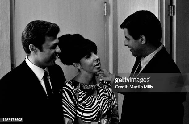 American singer and actor Steve Lawrence and American singer Eydie Gorme talk with American comedian, actor and singer Jerry Lewis back stage circa...