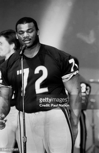 View of American football player William 'The Refrigerator' Perry, of the Chicago Bears, during the recording the 'Super Bowl Shuffle' at the Park...