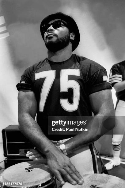 View of American football player Stefan Humphries, of the Chicago Bears, behind a drum kit during the recording the 'Super Bowl Shuffle' at the Park...