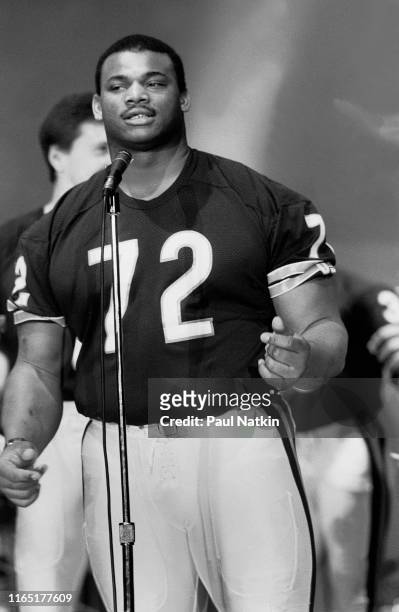 View of American football player William 'The Refrigerator' Perry, of the Chicago Bears, during the recording the 'Super Bowl Shuffle' at the Park...