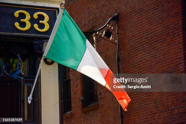 irish flag in boston - republic of ireland flag stock pictures, royalty-free photos & images