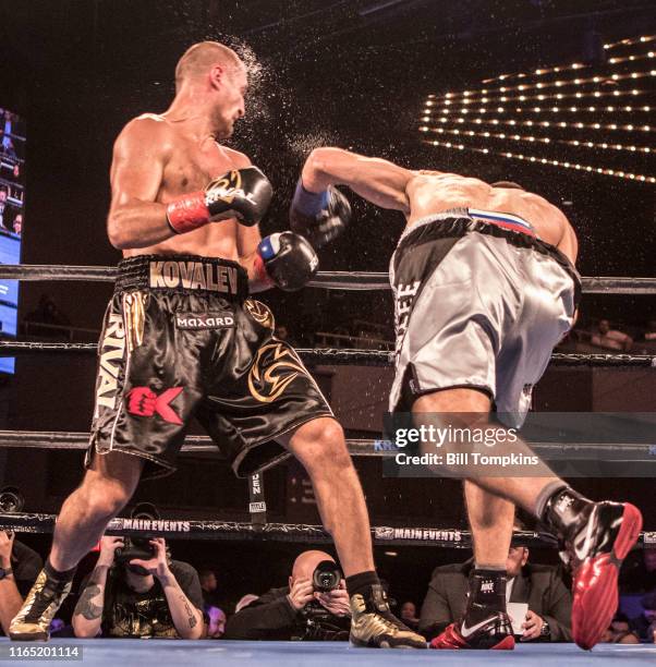 Bill Tompkins/Getty Images Sergey Kovalev defeats Igor Mikhalkin by TKO in the 7th round during their Light Heavyweight fight at Madison Square...