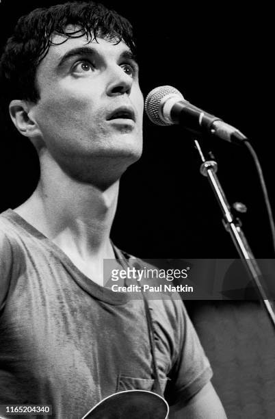 British/American New Wave musician David Byrne, of the group Talking Heads, as he performs onstage at the Park West, Chicago, Illinois, August 23,...