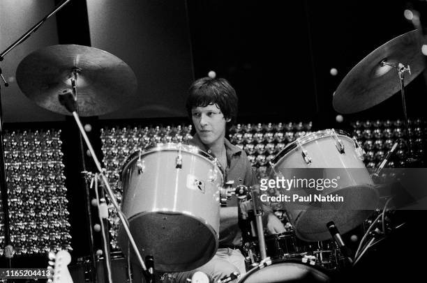 American New Wave musician Chris Frantz, of the group Talking Heads, plays drums as he performs onstage at the Park West, Chicago, Illinois, August...