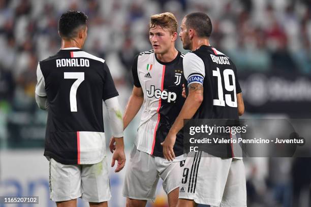 Cristiano Ronaldo, Matthijs De Ligt and Leonardo Bonucci talk during the Serie A match between Juventus and SSC Napoli at Allianz Stadium on August...