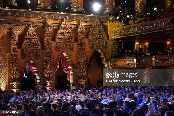 The audience watches the start of the beginning of the Democratic Presidential Debate at the Fox Theatre July 30, 2019 in Detroit, Michigan. 20...