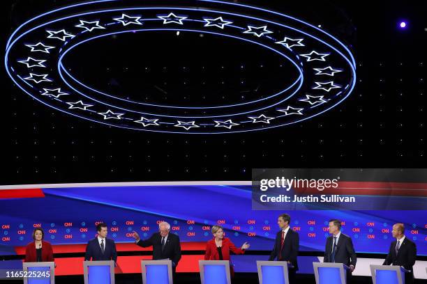 Democratic presidential candidates Sen. Amy Klobuchar , Indiana Mayor Pete Buttigieg, Sen. Bernie Sanders , Sen. Elizabeth Warren , former Texas...