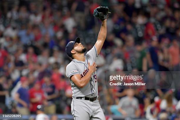 Closing pitcher Roberto Osuna of the Houston Astros celebrates after Houston defeated the Cleveland Indians at Progressive Field on July 30, 2019 in...
