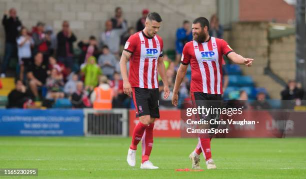 Lincoln City's Jason Shackell, left, and Lincoln City's Michael Bostwick during the Sky Bet League One match between Lincoln City and Fleetwood Town...