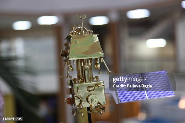 Scale models of the Indian moon shot on display at the head quarters of the Indian Space Research Organisation . These models were placed at the feet...