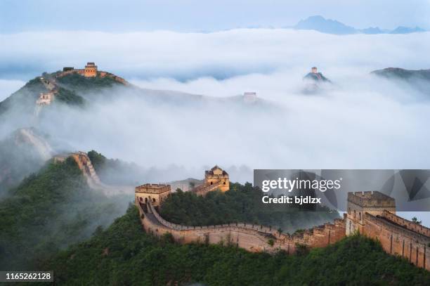 the great wall of jinshan mountains in the cloud sea - amazing architecture stock pictures, royalty-free photos & images