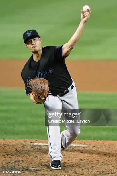 Wei-Yin Chen of the Miami Marlins pitches in the fifth inning during a baseball game against the Washington Nationals at Nationals Park on August 31,...