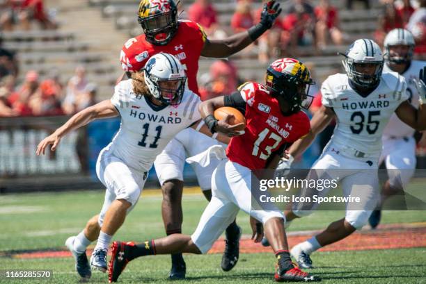 Howard Bison wide receiver Jordan Aley tries to stop Maryland Terrapins wide receiver Rayshad Lewis during a football game between the University of...