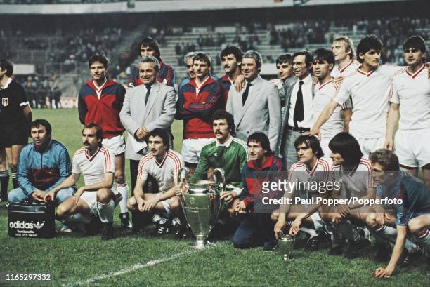 View of the Steaua Bucuresti team, with goalkeeper Helmuth Duckadam holding the European Cup trophy, during celebrations after Steaua Bucuresti...