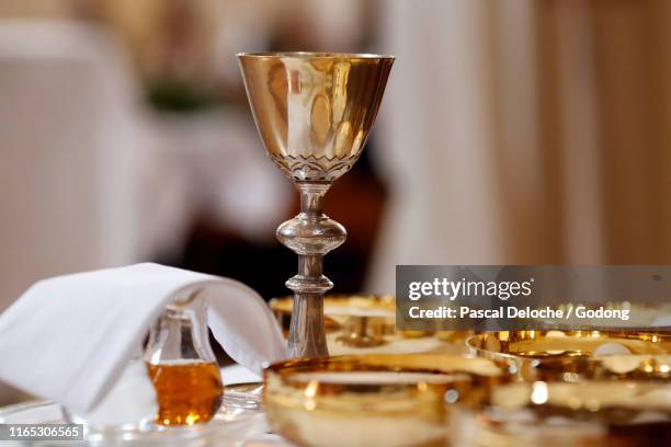 eucharist table for holy communion.  saint-nicolas de veroce church. france. - communion fotografías e imágenes de stock