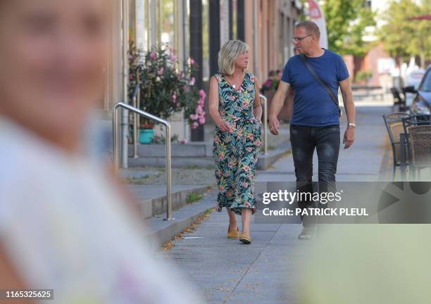 Top co-candidate in Brandenburg of the left wing Die Linke party Kathrin Dannenberg and her husband Mario arrive to cast their ballots for state...