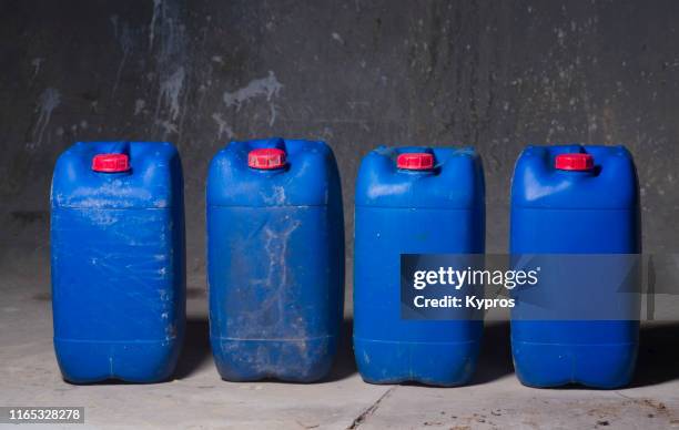 disposable agricultural insecticide poison containers - spraying weeds stock pictures, royalty-free photos & images
