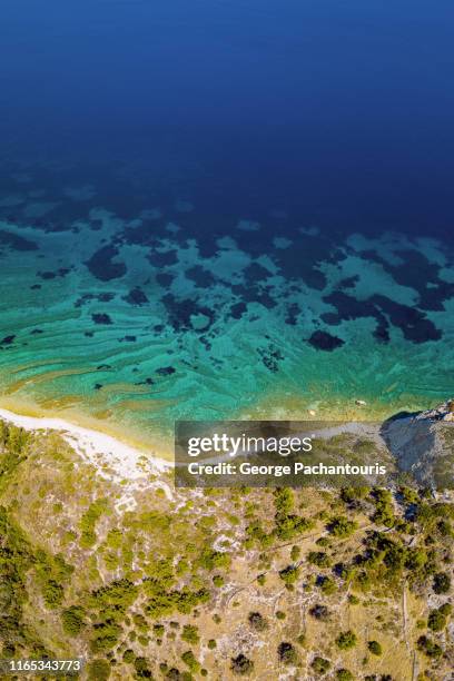 beautiful patterns on the sea near the shore - samos stock-fotos und bilder