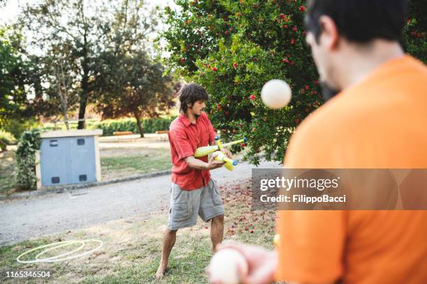 young adult jugglers training at the park - diablo dam stock pictures, royalty-free photos & images