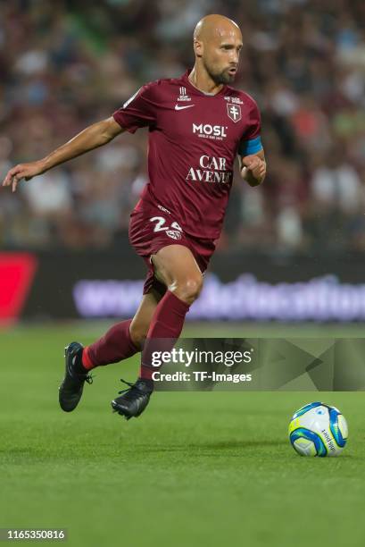 Renaud Cohade of FC Metz controls the ball during the Ligue 1 match between FC Metz and Paris Saint-Germain at Stade Saint-Symphorien on August 30,...