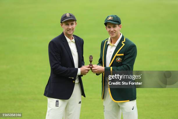 England captain Joe Root and Australia captain Tim Paine pictured holding the urn ahead of the First Ashes Test Match against Australia at Edgbaston...