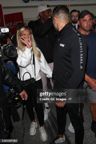 Molly-Mae and Tommy seen arriving at London Stansted airport on News  Photo - Getty Images