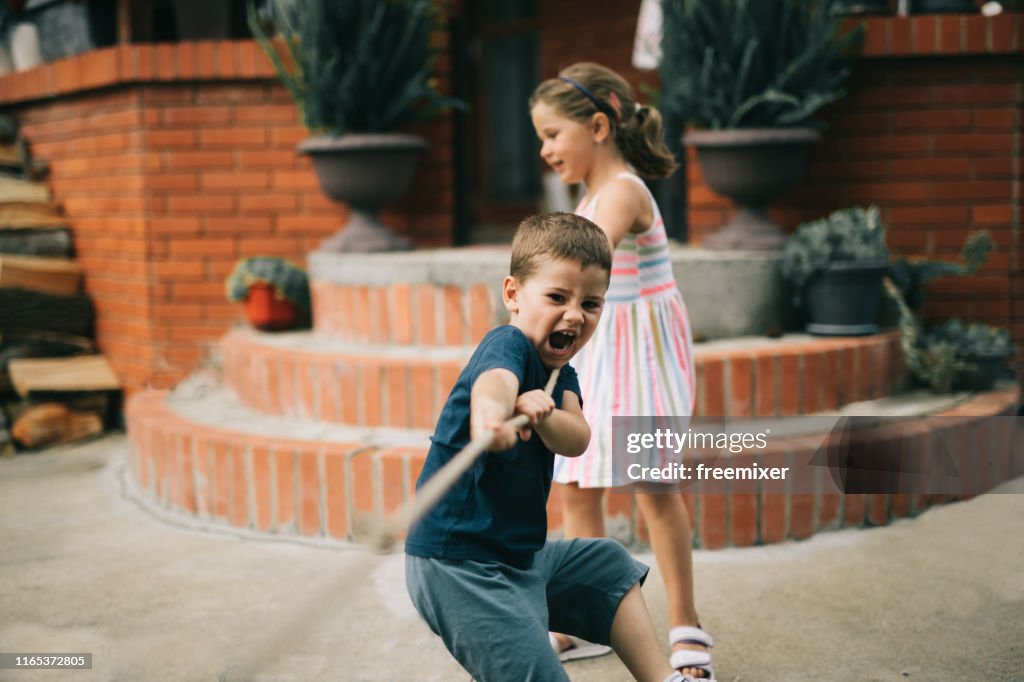 Kids Pulling A Rope High-Res Stock Photo - Getty Images
