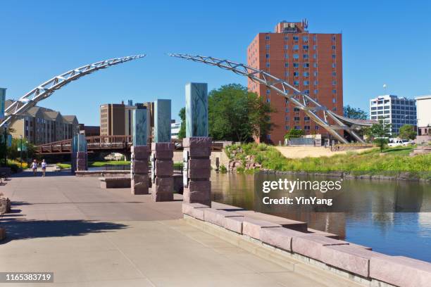 the river front walking and bike trail in downtown sioux falls, south dakota, usa - sioux falls stock pictures, royalty-free photos & images