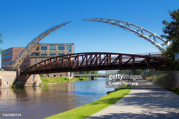 the river front walking and bike trail in downtown sioux falls, south dakota, usa - sioux falls stock pictures, royalty-free photos & images