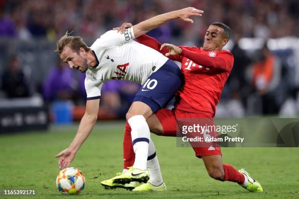 Harry Kane of Tottenham and Thiago of Bayern during the Audi cup 2019 final match between Tottenham Hotspur and Bayern Muenchen at Allianz Arena on...