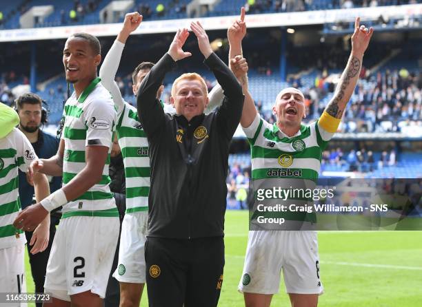 Celtic's Scott Brown with manager Neil Lennon at full time during the Ladbrokes Premier match between Rangers and Celtic at Ibrox Stadium, on...