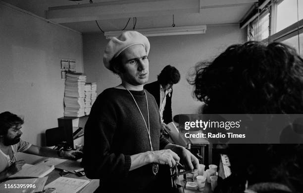 Writers Ian MacNaughton, Neil Innes and Michael Palin in a script conference for BBC television show 'Monty Python's Flying Circus', 1974.