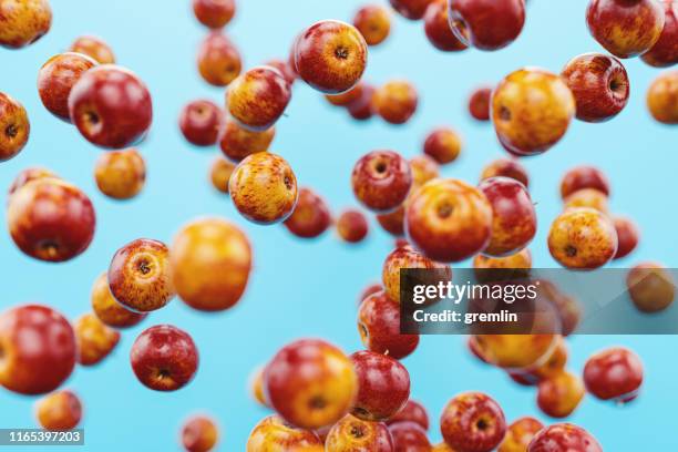 group of flying apples background - explosion of apples stock pictures, royalty-free photos & images