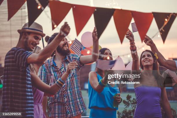 friends celebrating the 4th of july - fourth of july party stock pictures, royalty-free photos & images