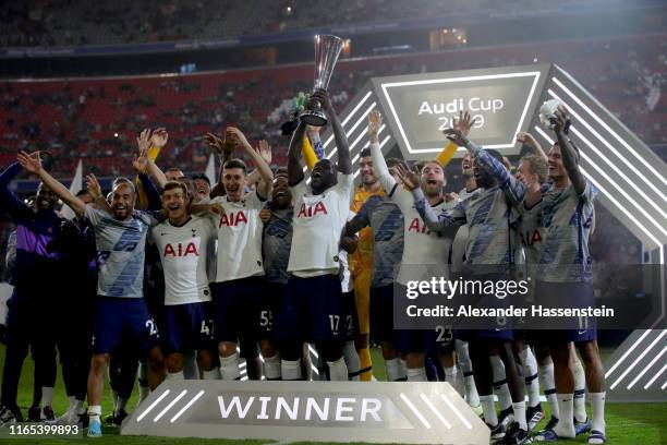 Players of Tottenham Hotspur lift the trophy after winning the Audi cup 2019 final match between Tottenham Hotspur and Bayern Muenchen at Allianz...