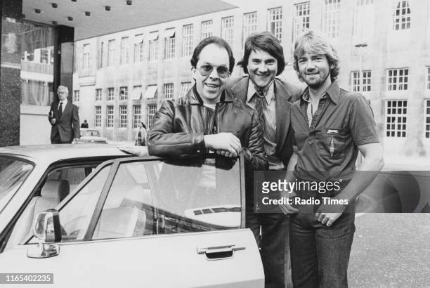 Radio personalities Andy Peebles, Dr Alan Maryon-Davis, Noel Edmonds outside BBC Radio 1 headquarters, London, circa 1980.