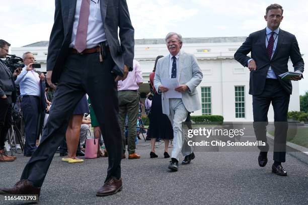 White House National Security Advisor John Bolton walks out of the White House West Wing before a FOX News interview July 31, 2019 in Washington, DC....