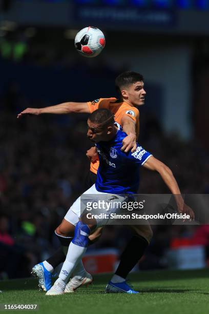 Richarlison of Everton battles with Ruben Vinagre of Wolves during the Premier League match between Everton and Wolverhampton Wanderers at Goodison...