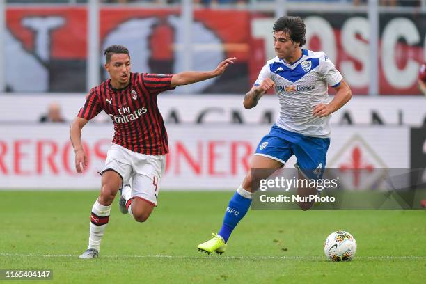 Ismael Bennacer of AC Milan and Sandro Tonali of Brescia Calcio in action during the Serie A match between AC Milan and Brescia Calcio at Stadio...